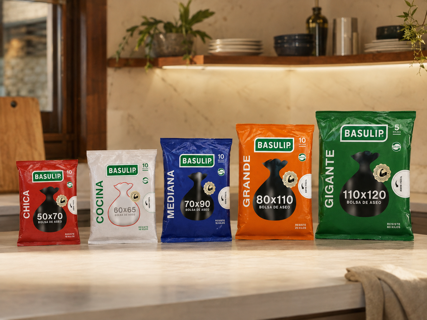 Full family of Basulip cleaning bags in five colours and sizes on a light background.