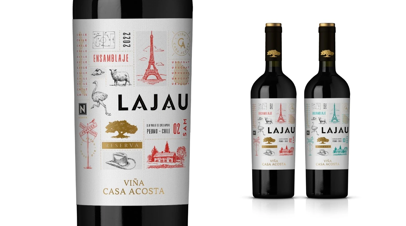 Primera ruta de etiqueta Lajau sobre botella de vino tinto.